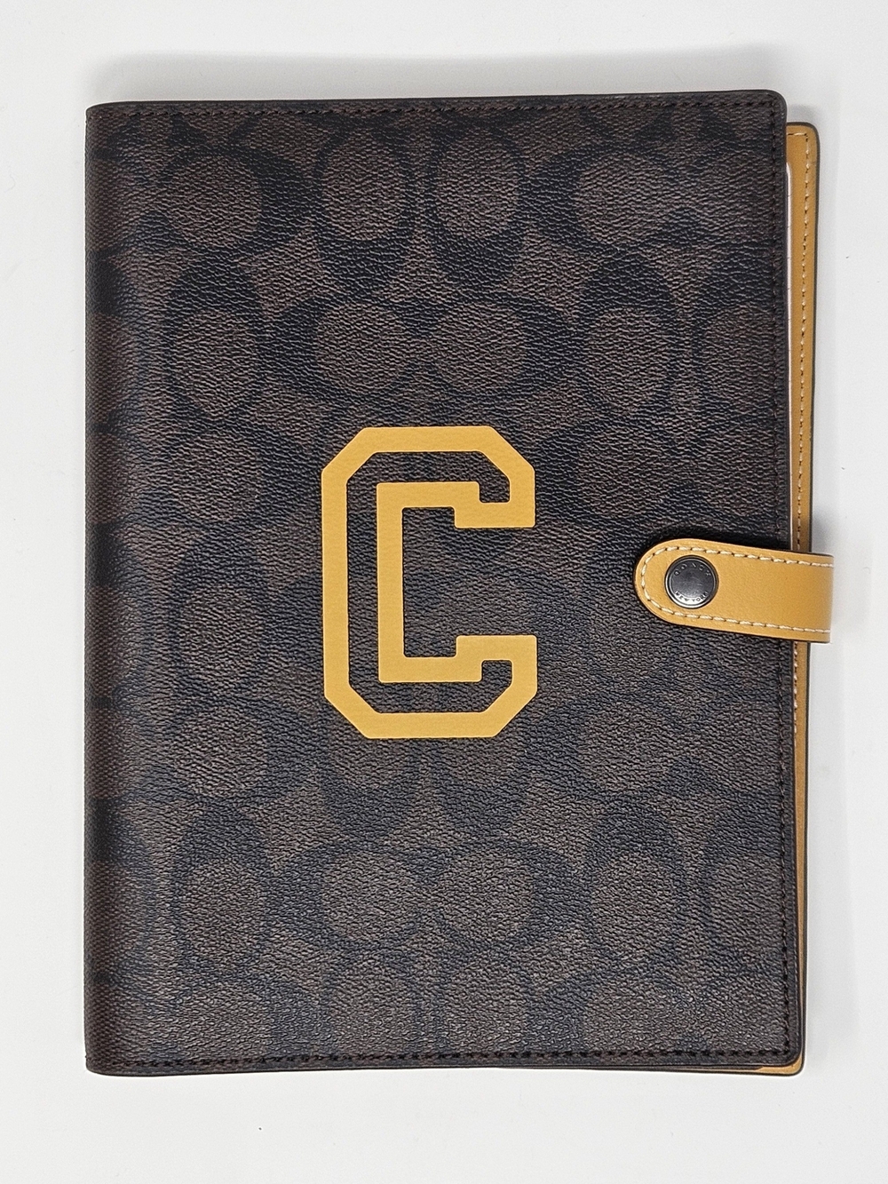 Coach Brown Signature Canvas Leather Notebook Cover with Yellow 'C' Accent